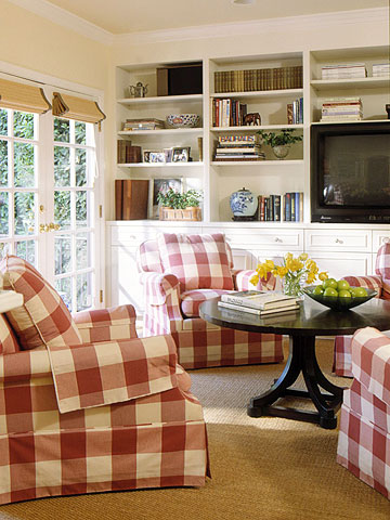 Buffalo-check armchairs paired with built-in bookshelves can make any room not only look cool but also functional.