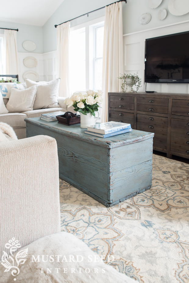 Turn a grain bin into a coffee table and you've got yourself a gorgeous focal point of the room.