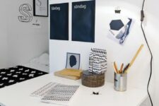 a Nordic home office nook with a chalkboard calendar – these black stickers are for each day of the week