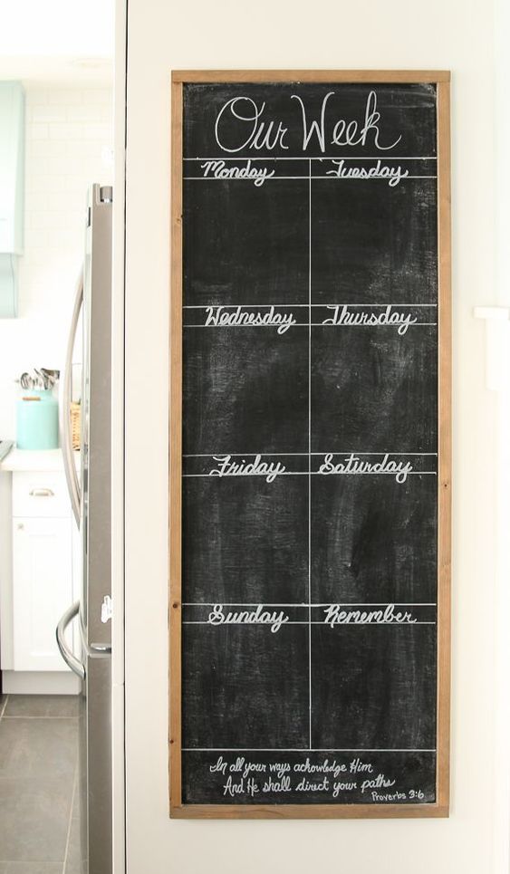 a chalkboard in a frame is a lovely idea to make notes and write down everything you need and it cna be attached anywhere