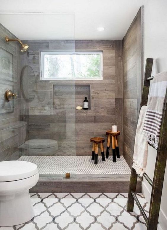 https://www.digsdigs.com/photos/2015/02/a-contemporary-farmhouse-bathroom-with-mosaic-tiles-on-the-floor-wood-inspired-tiles-in-the-shower-and-a-large-ladder.jpg