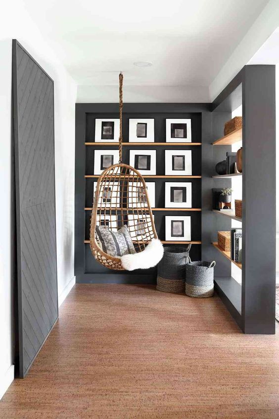 a nook with built-in wooden ledges that perfect for displaying any photos and pics