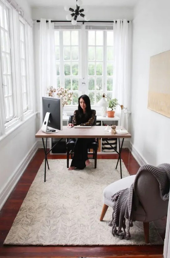 a sunroom turned into a home office guarantees much fresh air, sunshine and inspiration for work