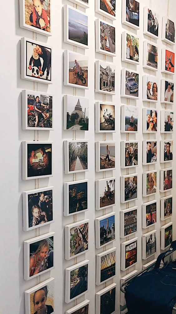 an Instagram gallery wall with photos on white cubes is a very stylish and modern idea to go for