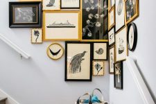 go for an awkward nook decorated with a lovely vintage gallery wall with gold and black frames