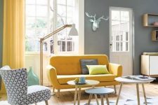 a cute grey and yellow living room design