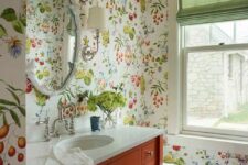 a lovely bathroom with a floral geometric wallpapers on walls