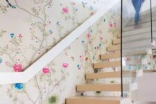 chinoiserie-inspired floral wallpaper and neutral stairs that stand out