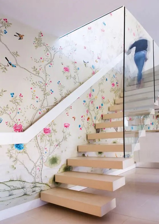 chinoiserie inspired floral wallpaper and neutral stairs that stand out