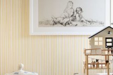 delicate yellow and white striped wallpaper will add color and interest to the space in a very gentle way