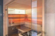 a little cozy saune clad with wood, with a long skylight and built-in lights is very relaxing and natural