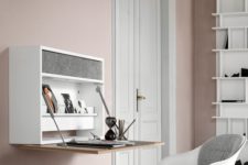 a minimalist storage unit with a foldable desk and a drawer inside will fit any minimalist space