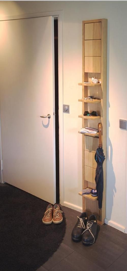 a small minimalist storage unit with foldable mini shelves for holding all the small stuff