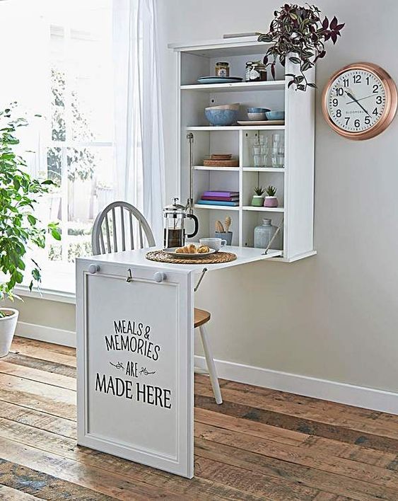 a wall-mounted foldable kitchen table will be a perfect breakfast nook for your small space