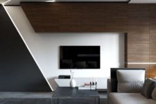 a bold minimalist living room with dark stained wood, geometric touches, a sectional sofa and built-in lights for a futuristic feel