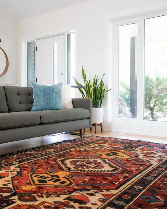 a colorful boho rug isn't only a hot decor trend but also a way to sound proof your home