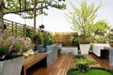 a modern outdoor deck with concrete planters
