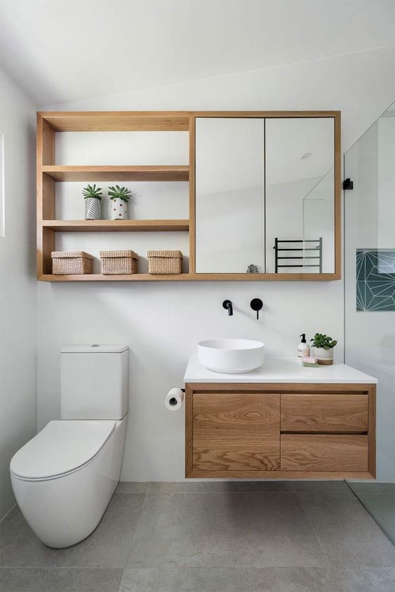 a sleek and chic mirror bathroom cabinet with open shelves and a storage space with mirror doors is a lovely idea for a modern bathroom