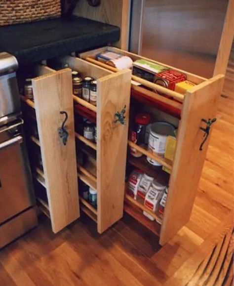 a small cabinet can hold several vertical drawers to store more stuff, which is great for a small kitchen