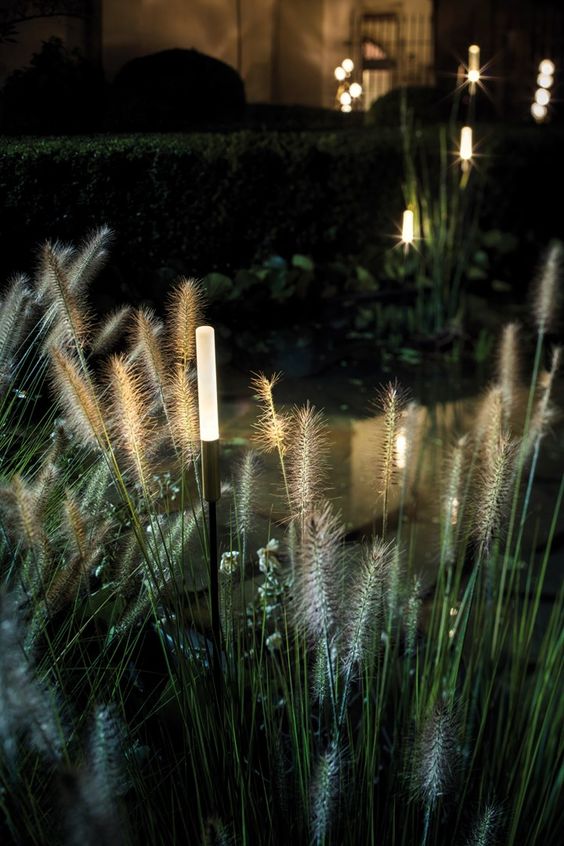 grasses with integrated outdoor lights that resemble them look very stylish and very chic