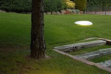 sleek modern pebble-liek outdoor lamps liek these ones will instantly add curb appeal to your house and will give an edge to your outdoor space
