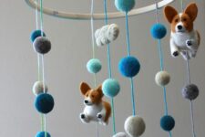 a colorful corgi mobile with felt beads, clouds and half moons is a super fun and cool idea, especially if you have a corgi