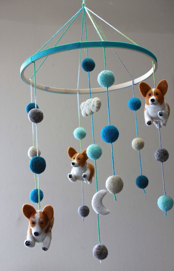 a colorful corgi mobile with felt beads, clouds and half moons is a super fun and cool idea, especially if you have a corgi