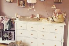 Add some “love” to the dresser if you want to create a perfect nursery for a coming baby.