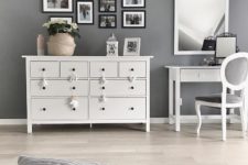Turn the space above a dresser into a stylish gallery wall.
