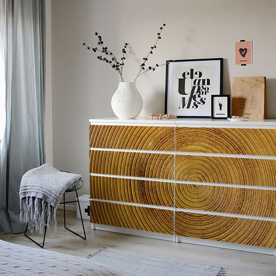 IKEA Malm dresser hack with gorgeous wood-imitating stickers that add texture and structure to the space