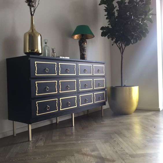 IKEA Malm hack in navy, with yellow drawer trim, ring pulls and brass legs for a touch of vintage elegance