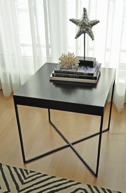 a chic Lack table hack in black with a new metal base will easily fit any modern or Scandinavian space