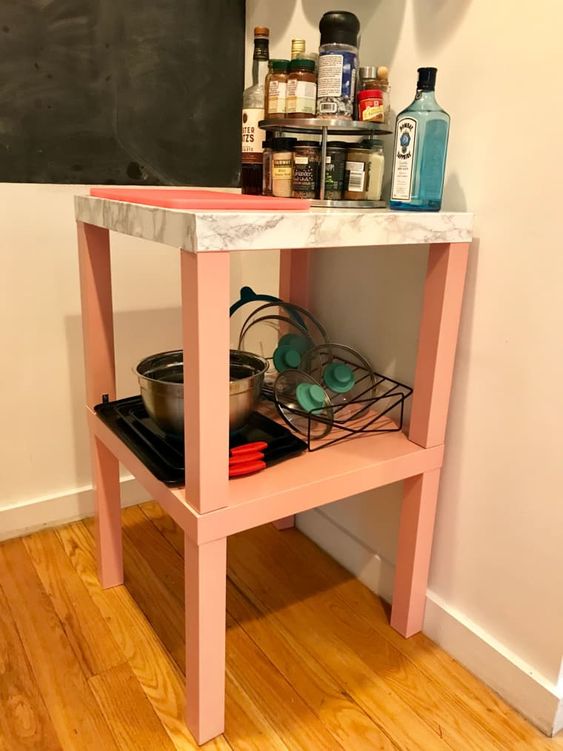 a couple of IKEA Lack tables done into a single kitchen storage unit in pink and marble or in a tall kitchen island is a lovely idea