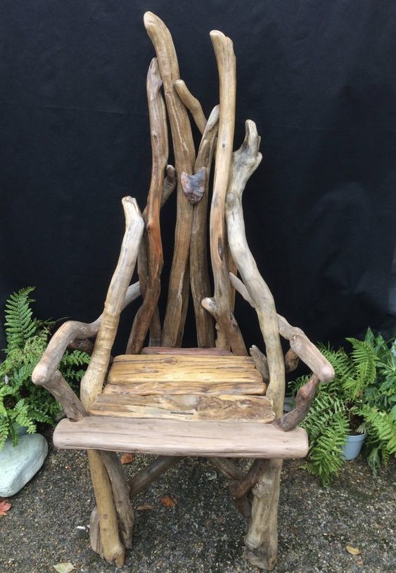 a garden chair of driftwood and some usual wood will be a nice idea for outdoors and it looks cool and lovely