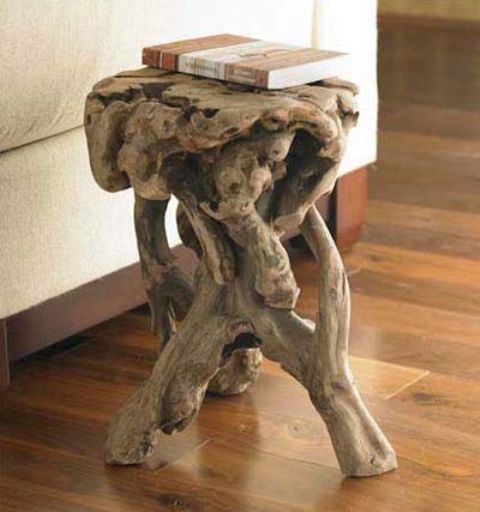 a little and cool driftwood side table made of a single piece of driftwood is a lovely way to reuse some driftwood making it a statement decor piece