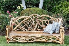 a unique garden bench made of driftwood, with printed pillows is an interesting solution and it lets reuse some simple driftwood