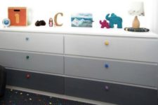 an ombre IKEA Malm dresser hack from dove grey to asphalt grey and colorful knobs is great for a kid’s room