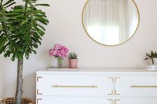ultimate glam with a white Malm dresser accessorized with gold handles and gold corners