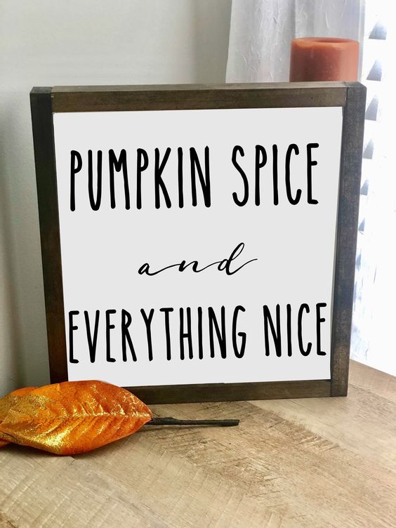 a laconic fall sign in a stained frame and with black letters for outdoor or indoor fall decor