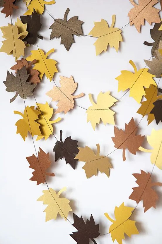 a simple colorful cardboard paper bunting is a timeless decor idea for fall and Thanksgiving