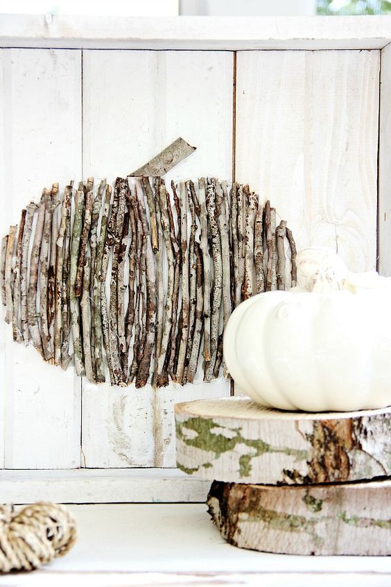 a twig pumpkin on a board is an easy rustic inspired fall decoration you can make yourself