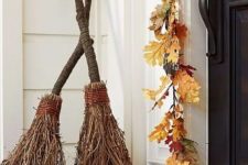 brooms made with twigs can be a nice decoration for Halloween and they are easy to make