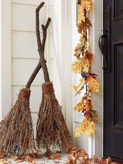 brooms made with twigs can be a nice decoration for Halloween and they are easy to make