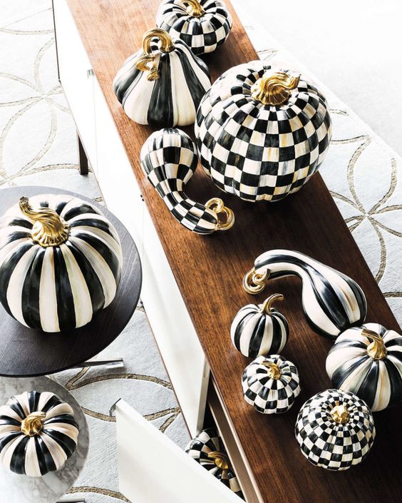 fun faux pumpkins and gourds painted black and white check and stripe prints are adorable and chic