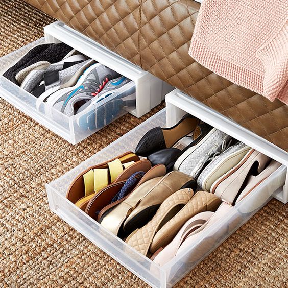 small plastic drawers for shoes inserted under a closet, wardrobe or bed will help your oganize a bit