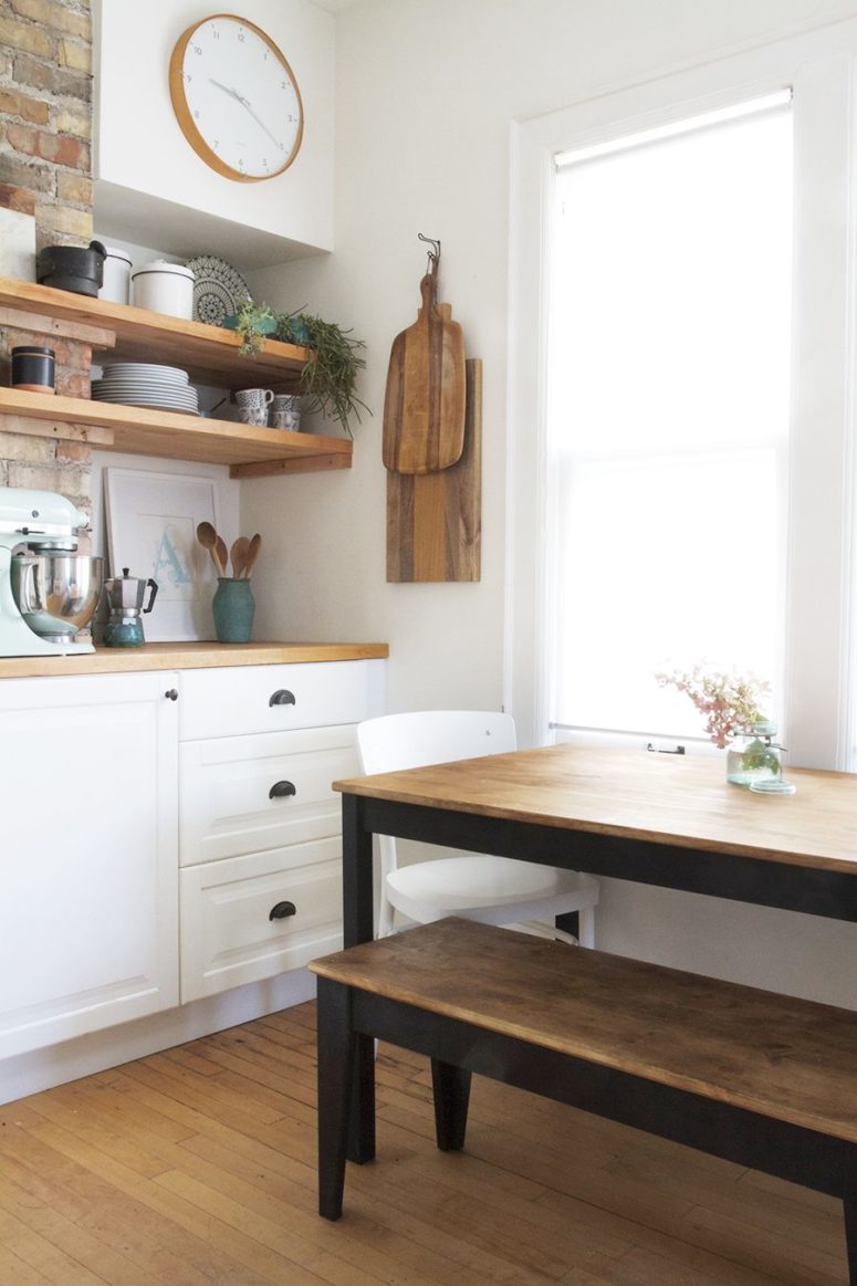 Natural stain mixed with black frame looks great on a mid-century kitchen.