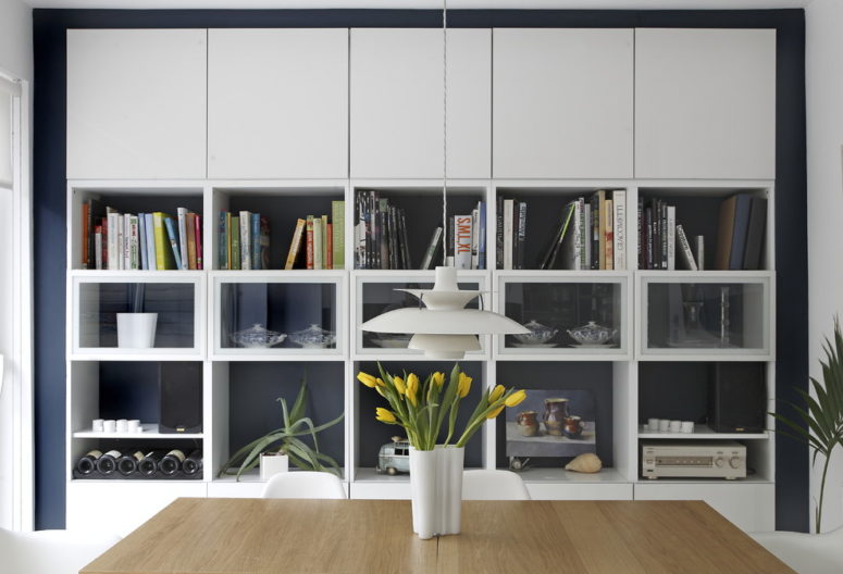 By mixing laminate and glass doors doors with open shelves you can get storage for everything you need.  (Optimise Design)