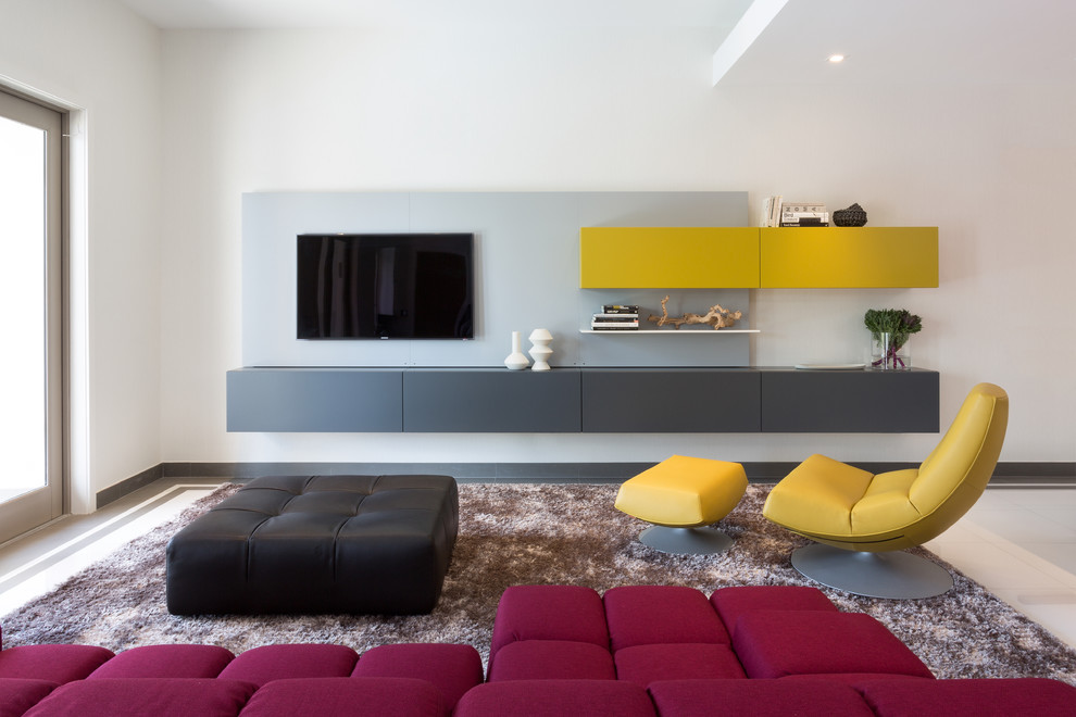 Grey and yellow is a great color mix you could use designing your living room's storage.