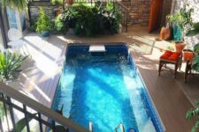 a boho sunroom with a pool
