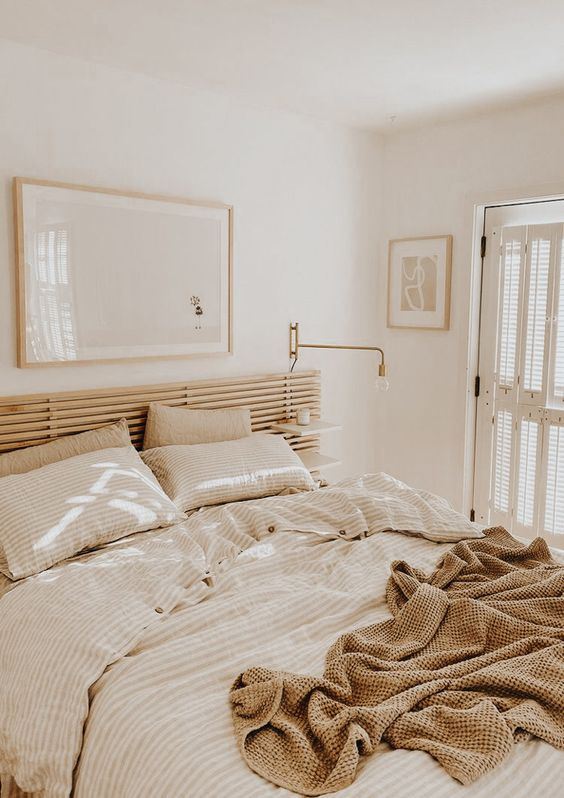 all neutrals make the bedroom look bigger and more inviting thanks to the soft and warm shades